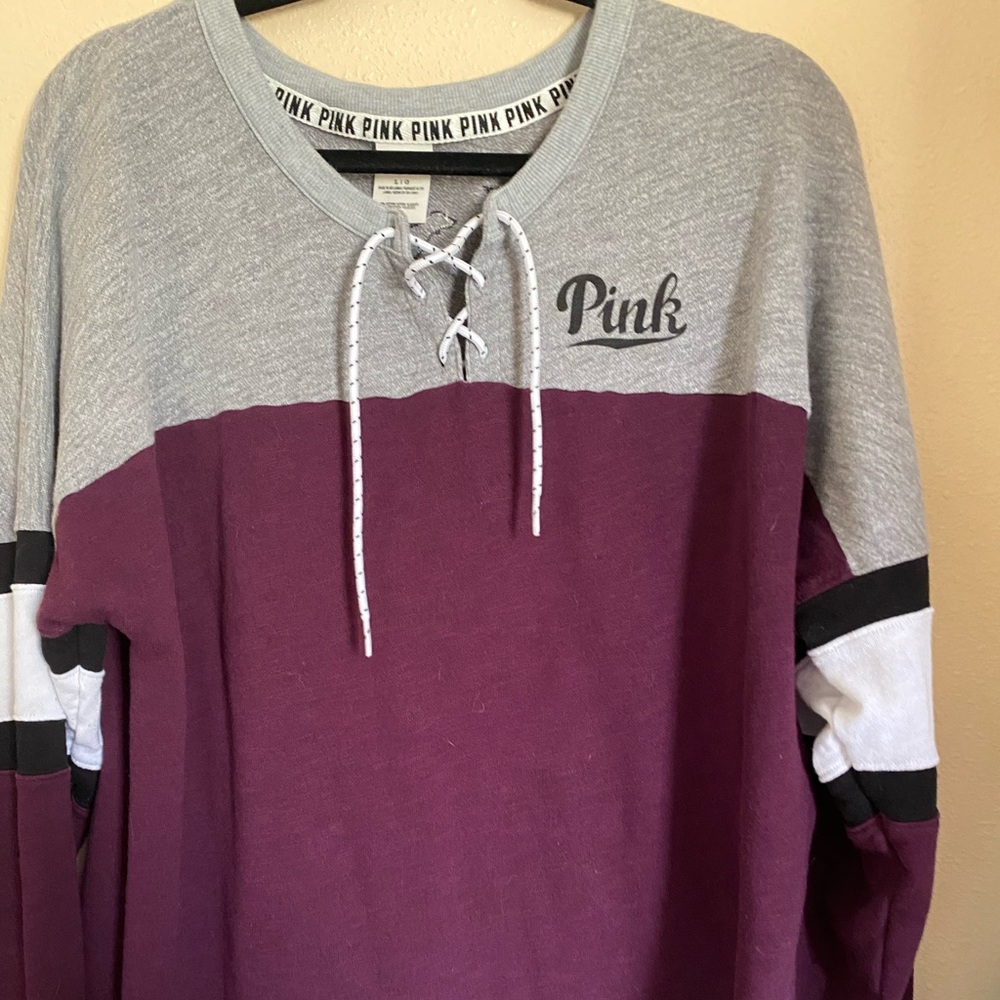 Burgundy, grey with black lettering.